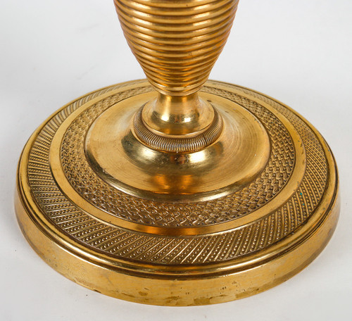 Ein Paar kleiner Kerzenhalter, genannt Ragot, aus ziselierter und vergoldeter Bronze Epoche des Empire um 1810