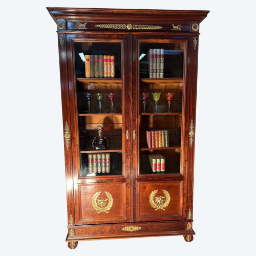 Large Empire-style bookcase in speckled mahogany