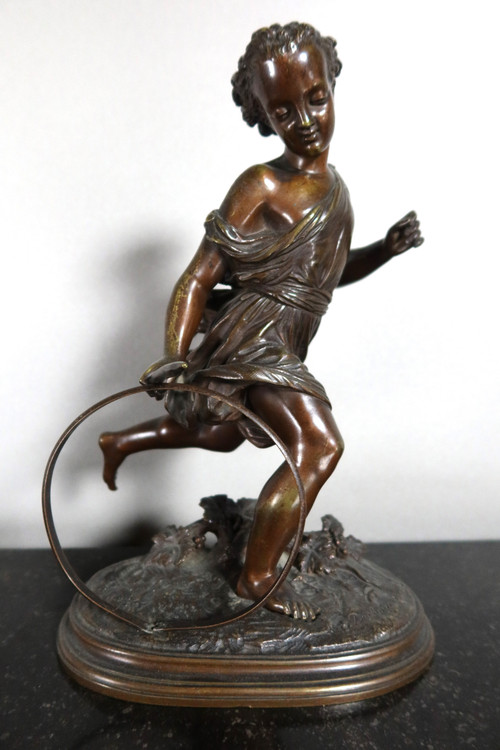 Soggetto in bronzo "L'enfant au cerceau" firmato