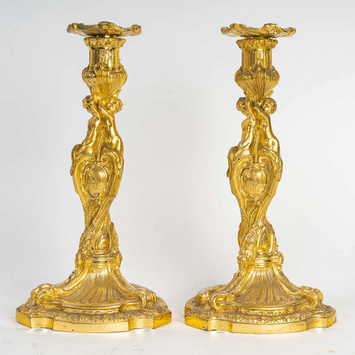After Juste-Aurèle Meissonnier Pair of Louis XV style chiseled gilt bronze candlesticks Circa 1880