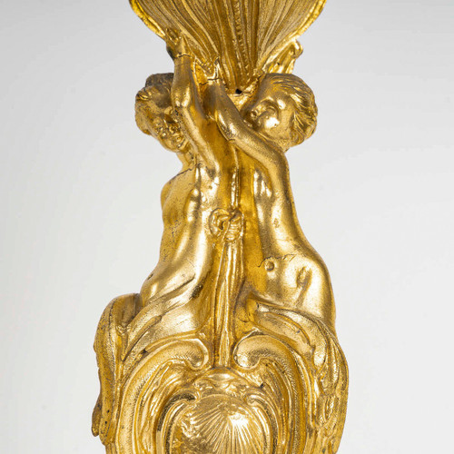 After Juste-Aurèle Meissonnier Pair of Louis XV style chiseled gilt bronze candlesticks Circa 1880