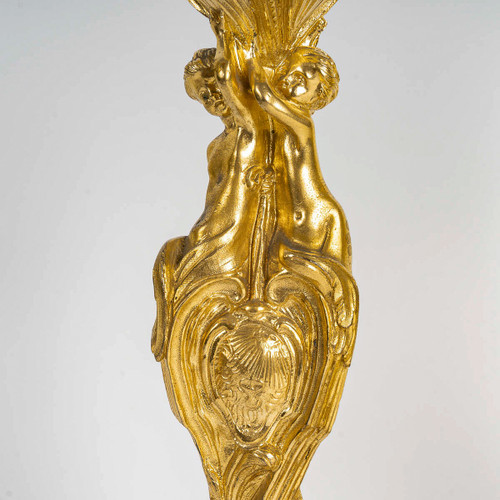 After Juste-Aurèle Meissonnier Pair of Louis XV style chiseled gilt bronze candlesticks Circa 1880
