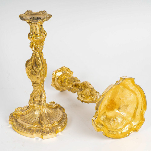 After Juste-Aurèle Meissonnier Pair of Louis XV style chiseled gilt bronze candlesticks Circa 1880