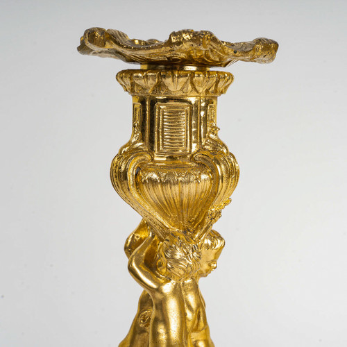 After Juste-Aurèle Meissonnier Pair of Louis XV style chiseled gilt bronze candlesticks Circa 1880