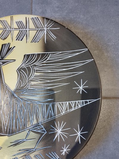 Vallauris plate with incised decoration.
