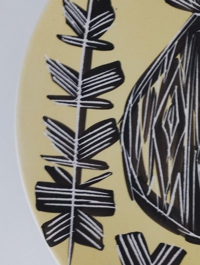 Vallauris plate with incised decoration.