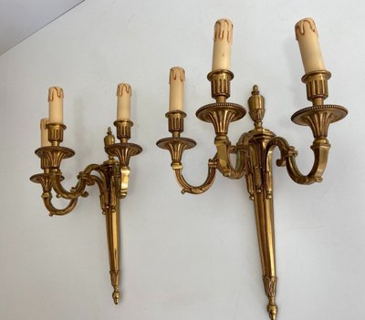Coppia di applique a 3 bracci in bronzo stile Luigi XVI di Lucien Gau