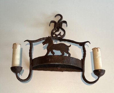Paire d'Appliques En Fer Forgé Représentant des Animaux. Travail Français. Vers 1940