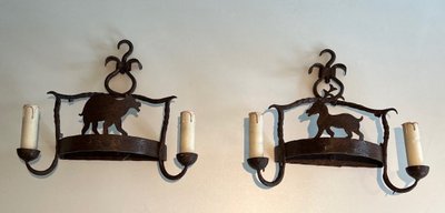 Paire d'Appliques En Fer Forgé Représentant des Animaux. Travail Français. Vers 1940