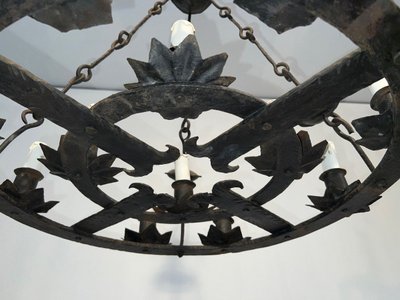 Important 12-Light Wrought Iron Chandelier. French Gothic work. Circa 1940