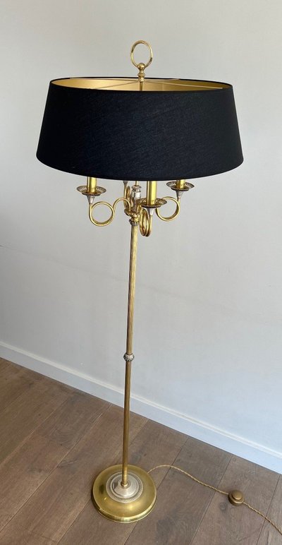 Coppia di lampade da terra in acciaio e ottone spazzolato con corna da caccia.
