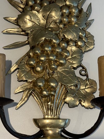 Pair of bronze and wrought iron wall lights depicting a bowl of fruit. French work.