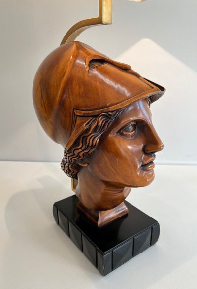 Pair of walnut lamps depicting the faces of helmeted soldiers. Italian work.