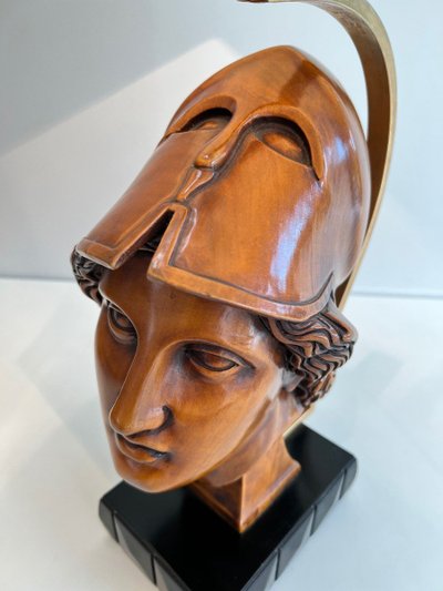 Pair of walnut lamps depicting the faces of helmeted soldiers. Italian work.