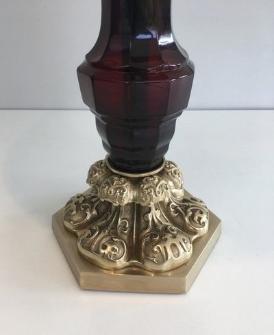 Lampada in bronzo e cristallo rosso scuro. Opera francese di De Cristal & Bronze Paris. Circa 1940