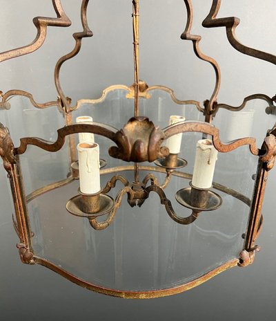 Lantern En Fer Forgé Battu Doré Et Verres Galbés. French work. Circa 1940