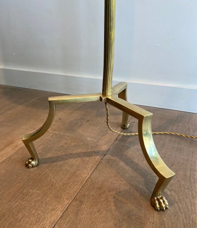 Brass reading lamp with removable, height-adjustable arm.