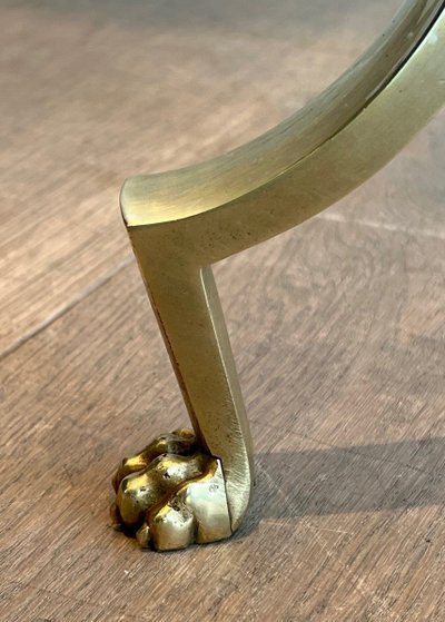 Brass reading lamp with removable, height-adjustable arm.