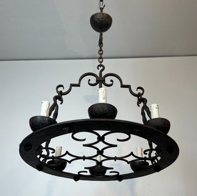 8-light round wrought iron chandelier. French Gothic work. Circa 1940