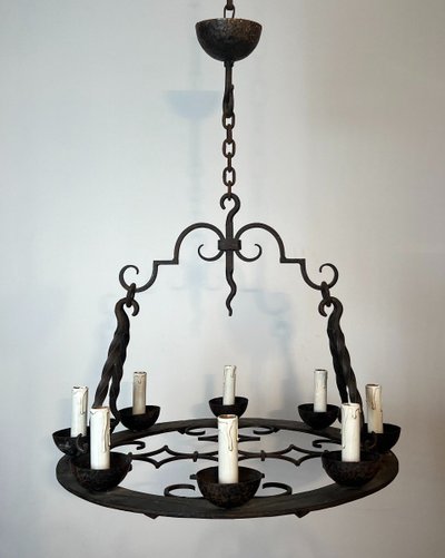 8-light round wrought iron chandelier. French Gothic work. Circa 1940
