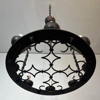 8-light round wrought iron chandelier. French Gothic work. Circa 1940