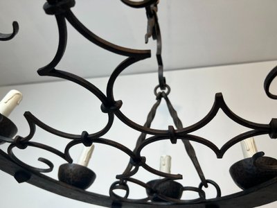 8-light round wrought iron chandelier. French Gothic work. Circa 1940