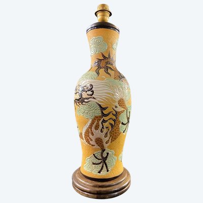 Very large BIEN HOA stoneware dragon lamp on yellow background Vietnam