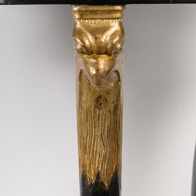 Black lacquered pedestal table decorated with eagle heads Consulat period (1799-1804)