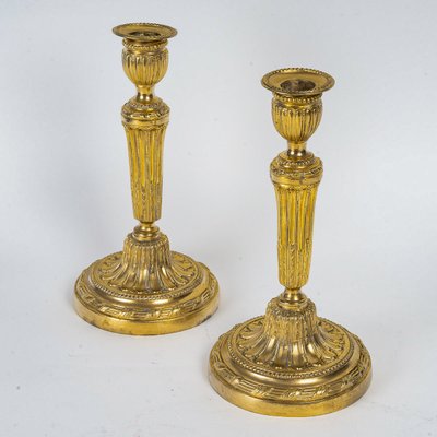 Pair of chiseled gilt bronze candlesticks Louis XVI period circa 1780