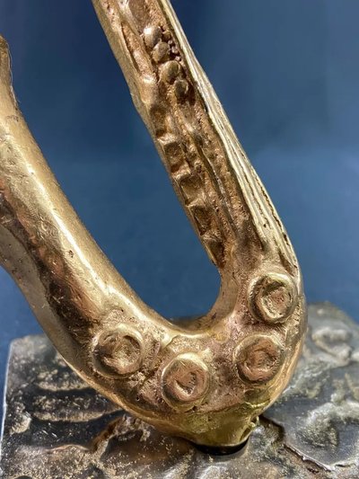 Carved saxophone subject in bronze signed Yves Lohé