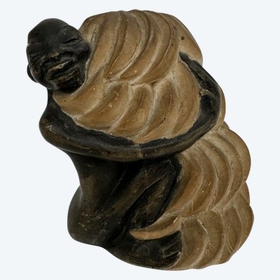Scultura africanista 1930 soggetto femminile che tiene in mano un casco di banane