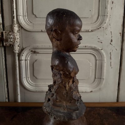 Scultura in terracotta Bambino dell'officina Charles Filleul in busto del XX secolo
