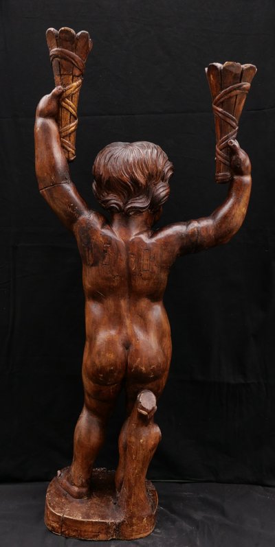 18th century FRENCH school, Torch-bearing Putto
