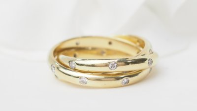 Three-ring wedding band in yellow gold and diamonds