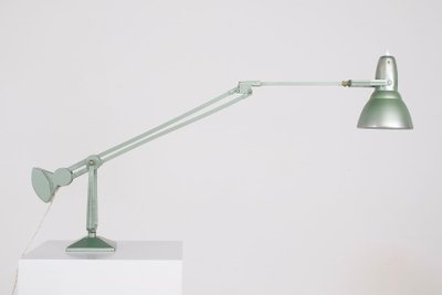 Workshop lamp with pendulum.