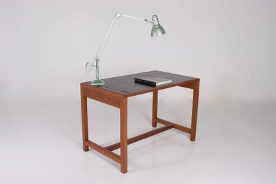 Workshop lamp with pendulum.
