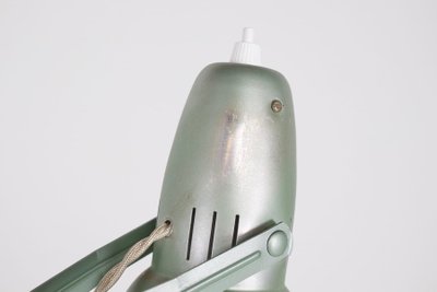 Workshop lamp with pendulum.