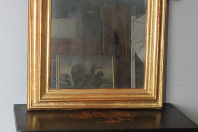 Miroir ancien du milieu du 18ème siècle. Or pur. avec belle cimaise. Mesure 135 x cm 95