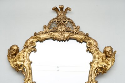 Miroir ancien en bois doré et sculpté. Rome XVIIIe siècle.