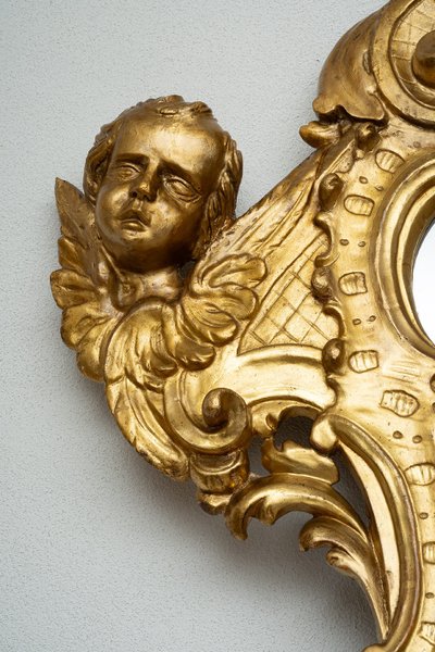 Miroir ancien en bois doré et sculpté. Rome XVIIIe siècle.