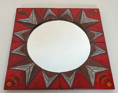 Ceramic Mirror Depicting a Stylized Sun on a Red Background Attributed to Oswal Tiberghien