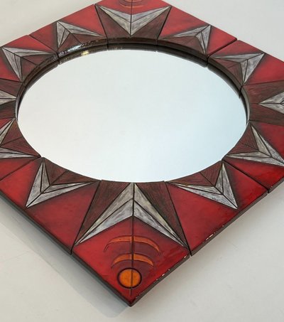 Ceramic Mirror Depicting a Stylized Sun on a Red Background Attributed to Oswal Tiberghien
