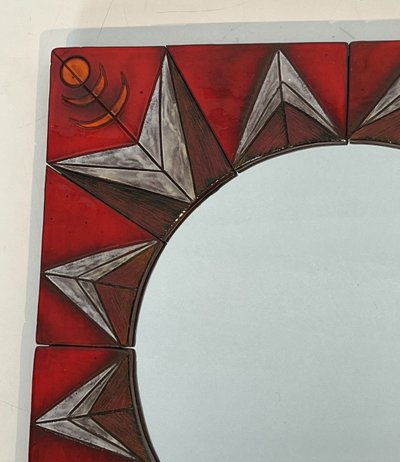 Ceramic Mirror Depicting a Stylized Sun on a Red Background Attributed to Oswal Tiberghien