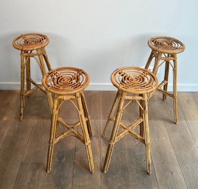 Set of 4 rattan stools. French work. Circa 1970