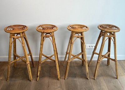 Set of 4 rattan stools. French work. Circa 1970