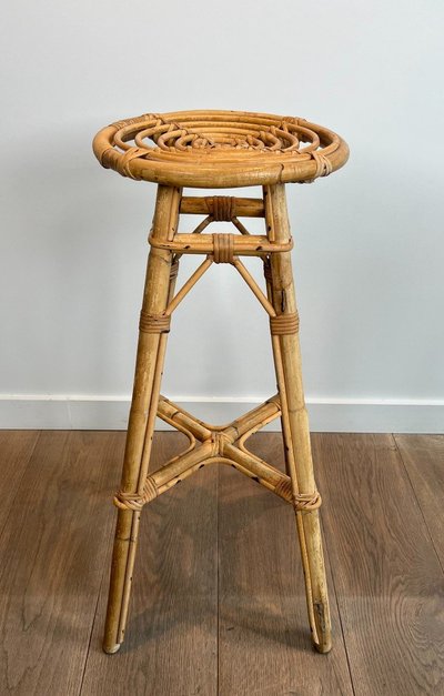 Set of 4 rattan stools. French work. Circa 1970