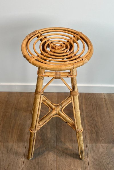 Set of 4 rattan stools. French work. Circa 1970