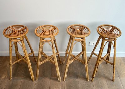 Set of 4 rattan stools. French work. Circa 1970