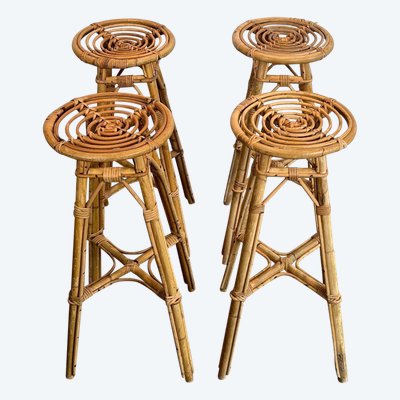 Set of 4 rattan stools. French work. Circa 1970