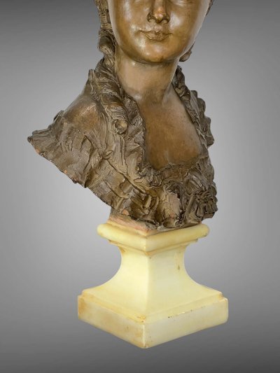 FERNAND CIAM 1886 - 1954 BUSTE DE JEUNE FEMME EN TERRE CUITE PATINÉE SUR SOCLE